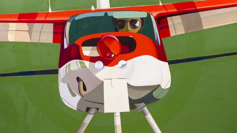 A painting of a red and white helicopter plane in flight, its nose facing the viewer. Inside is a man wearing aviation glasses, with light reflecting off the lens. The background is green, with a faint trace of a circle around the plane. 