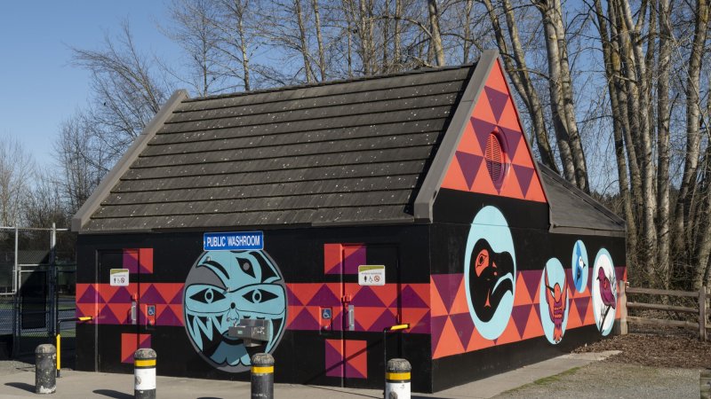 Mural at Black Spit Park washroom facility featuring artwork by Semiahmoo artist, Roxanne Charles.
