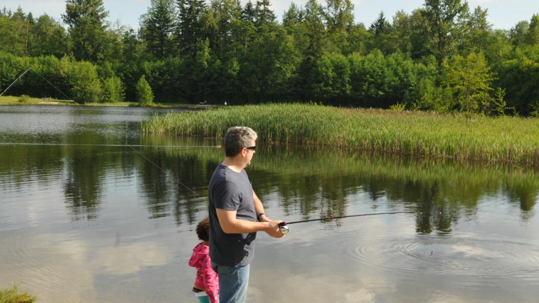 Man and Child Fishing in Green Timbers Lake