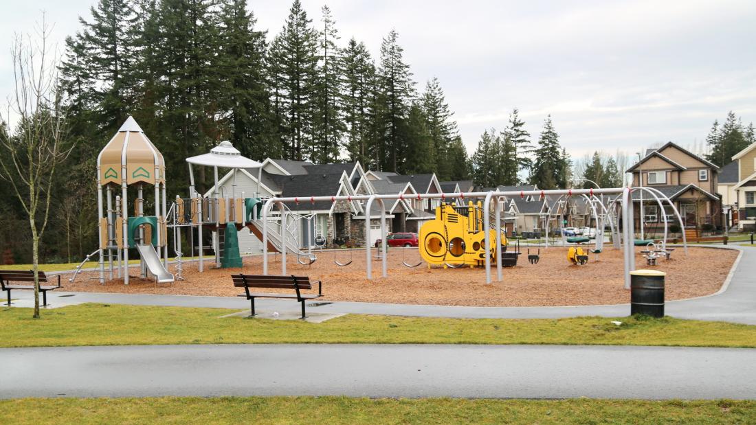 Playground with houses in the background