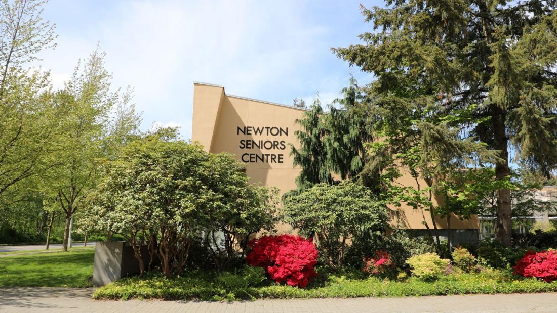 Exterior of the newton seniors centre surrounded by trees