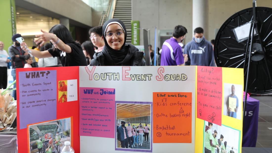a youth shares a poster about youth event squad