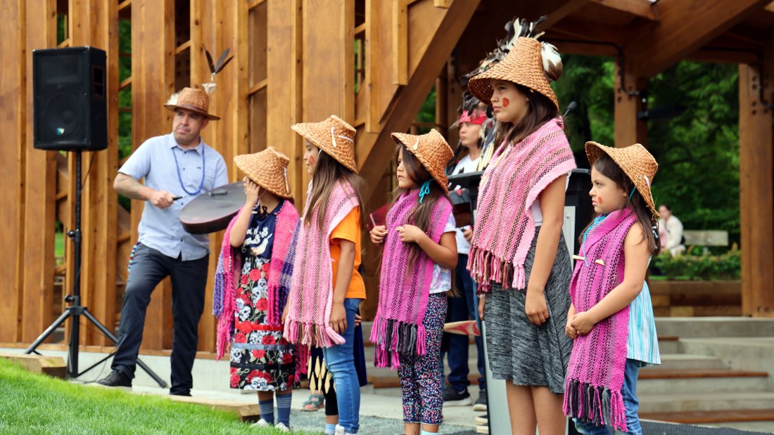 Chief Chappell and Semiahmoo children sharing songs at the opening.