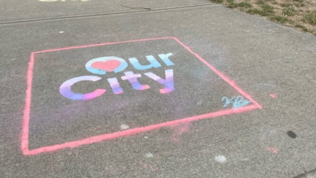 chalk of words "our city"