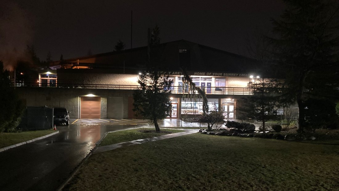 Exterior lights at South Surrey Arena when it's dark out.