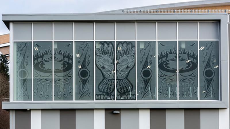 Trenton Pierre's design on the North Surrey Ice & Sport Complex windows symbolize reconciliation.