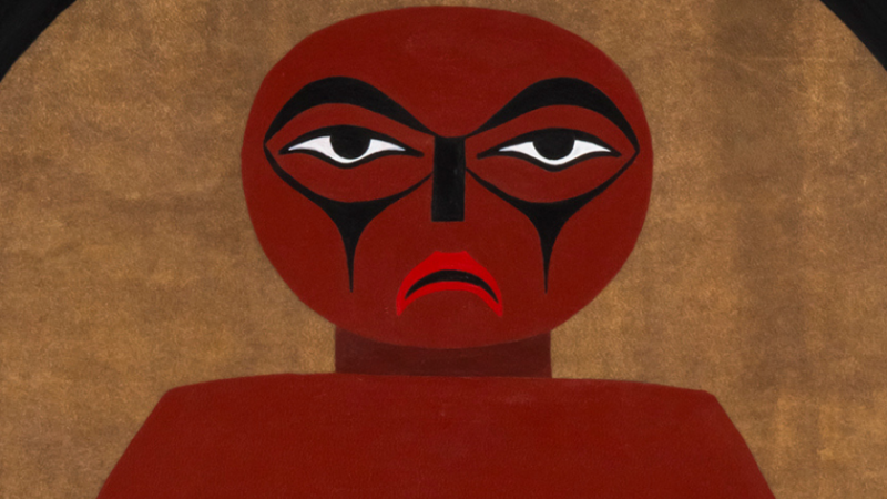 A man with face markings stares forward. A brown circle with a black border and blue shapes surrounds him.