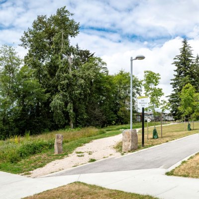 A sidewalk and a park path 