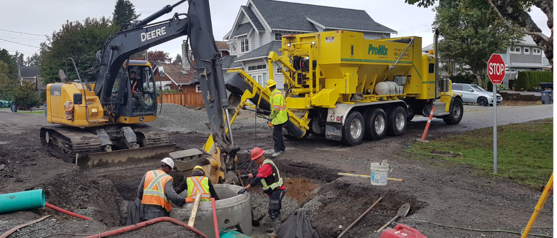 construction workers replace underground watermain