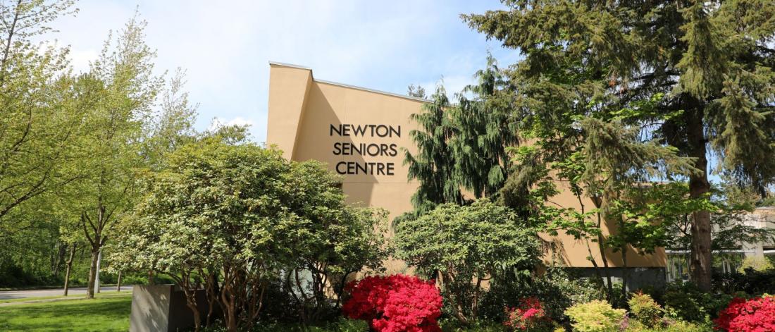 Exterior of the newton seniors centre surrounded by trees