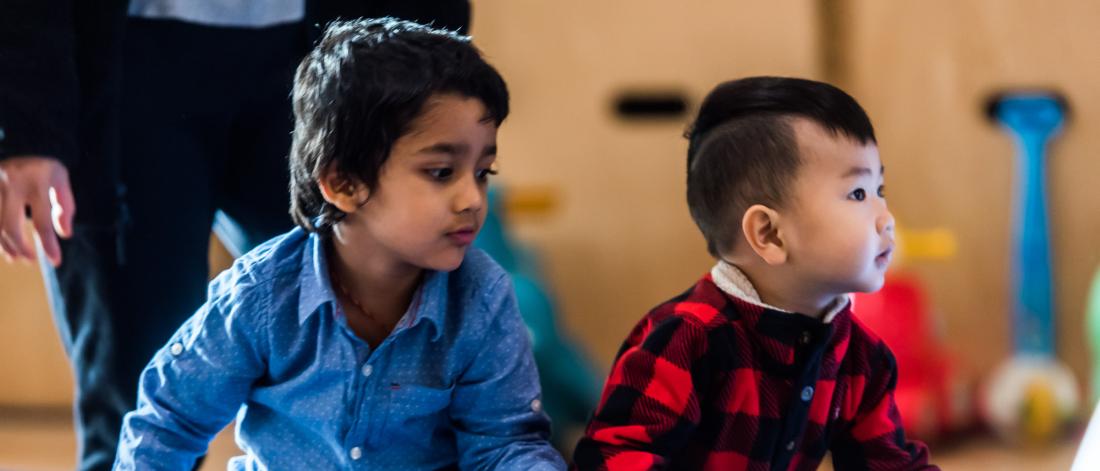 Two children at a Stay and Play drop-in program.