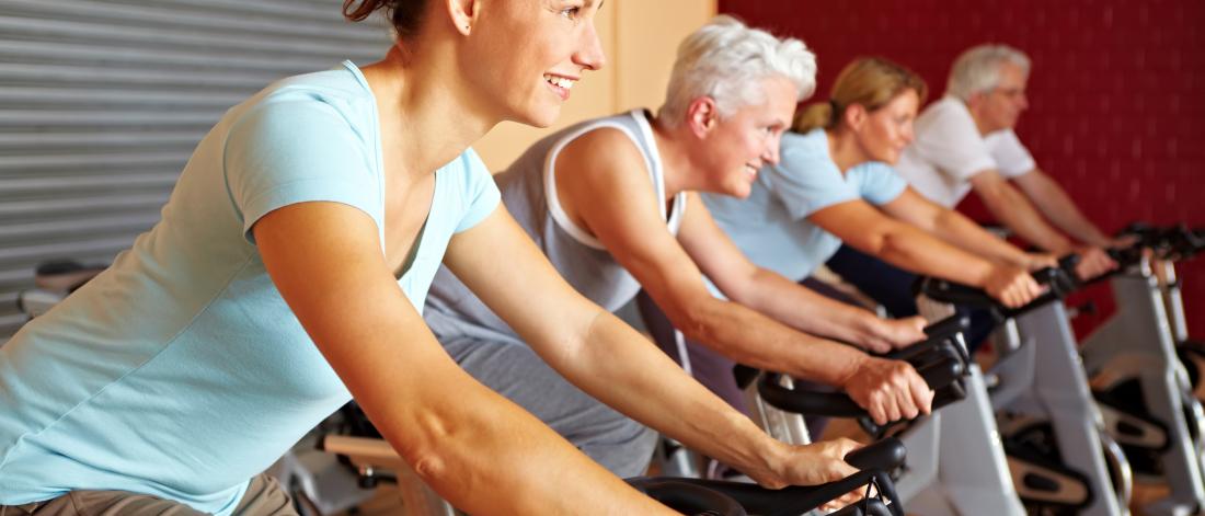 A group of people in a spin class.