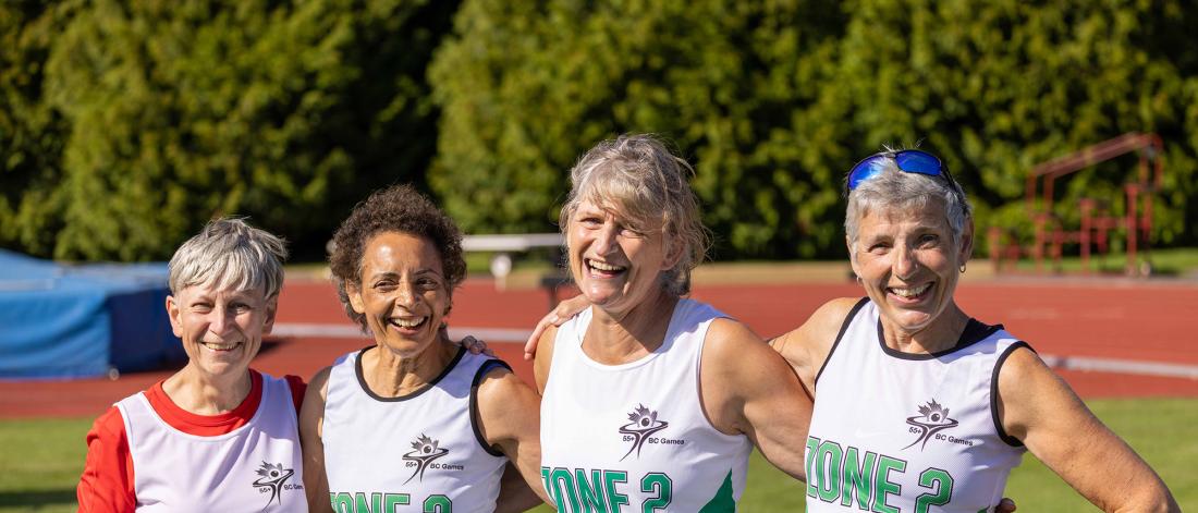 Senior women smiling at an athletic event