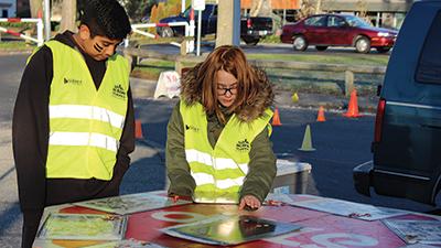 two youth playing a traffic education game