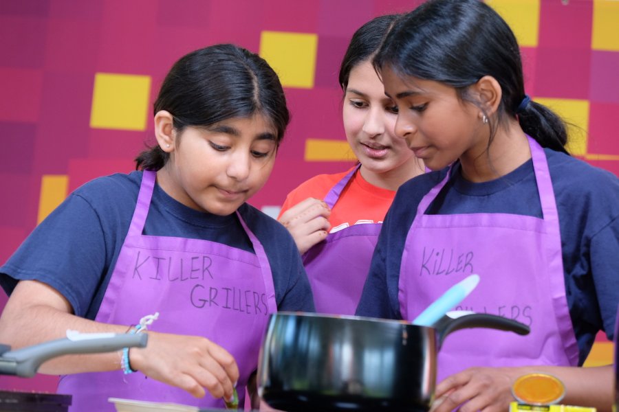 3 young girls at Cultural Cooking Arena